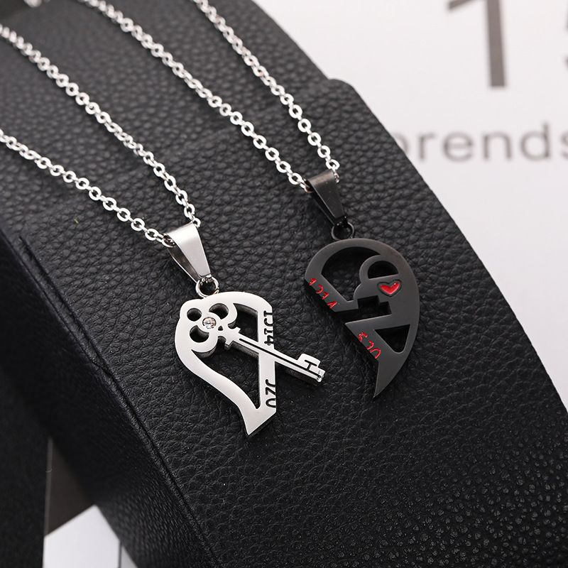 241006165321_7d1454d542a3a98f54af20d1b79a20f3 Cupid’s Bond Heart & Arrow Couple Necklace Set - Image 1