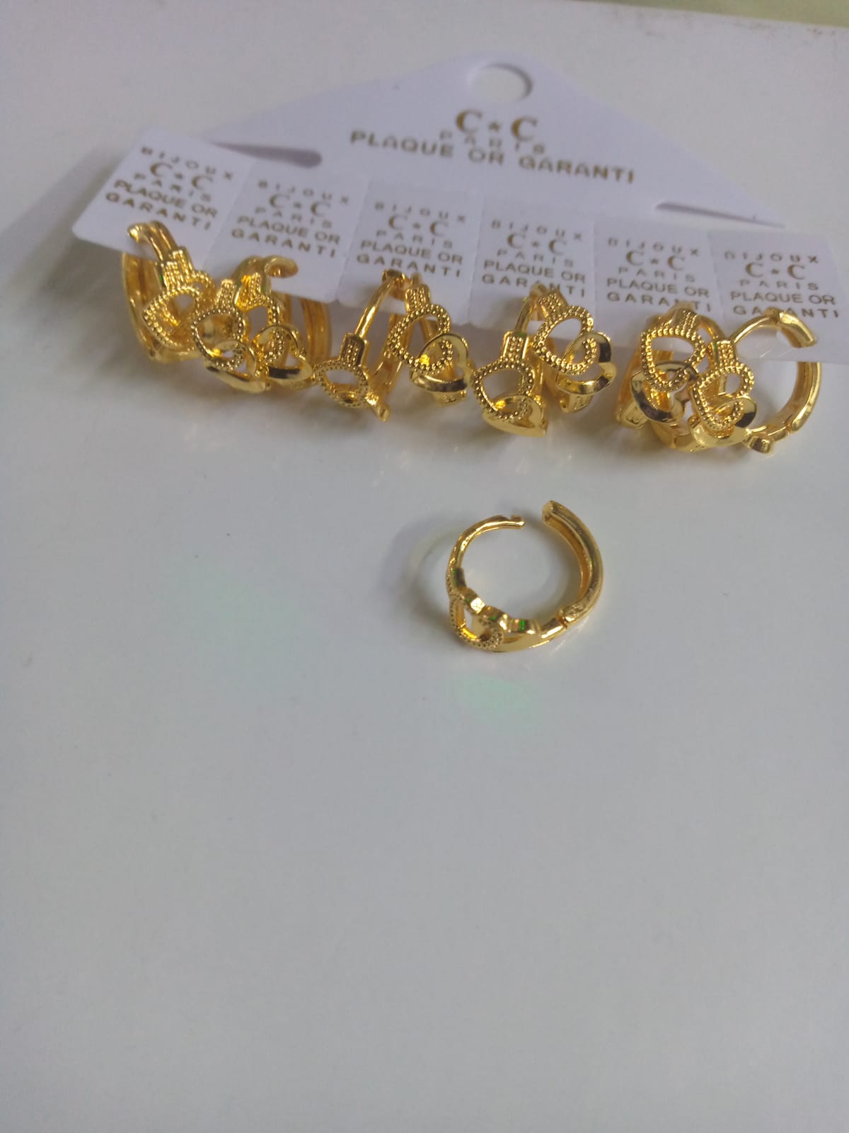 6d62ccb7-e427-4d37-aada-8b8d452e6818 (1) C.C. Paris Plaqué Or Garanti Hoop Earrings - Image 1