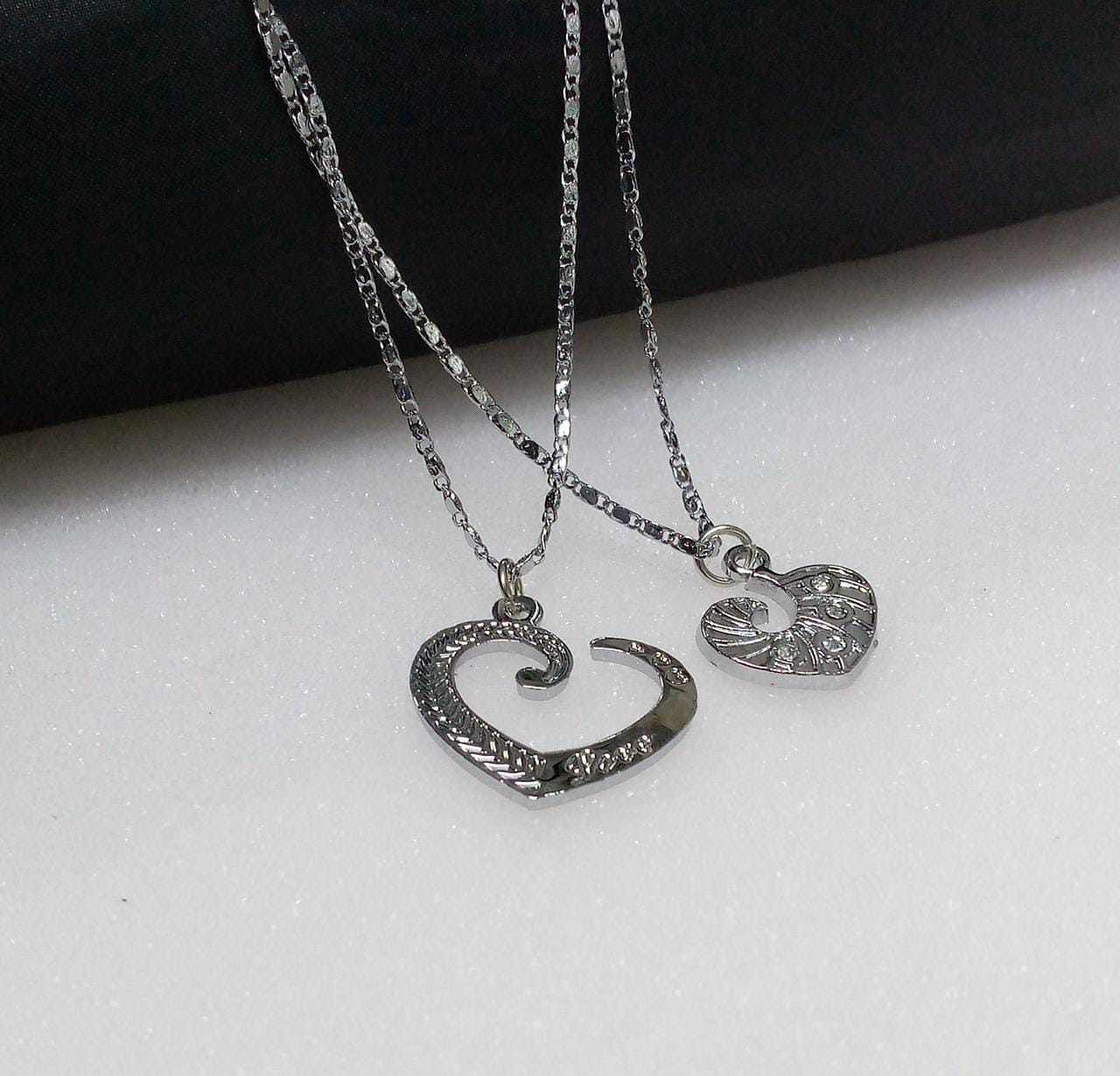 d08d5428-935b-479f-97b6-1a29aa755e6a Eternal Hearts Couple Pendant Necklace Set – Silver-Toned Stainless Steel - Image 1