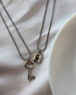 Cupid’s Bond Heart & Arrow Couple Necklace Set - Image 2